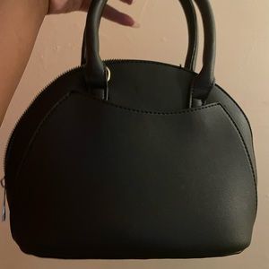 Small black purse with straps